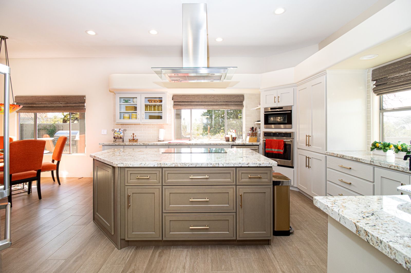 Open-plan kitchen and living area in Hamilton with a large island bench